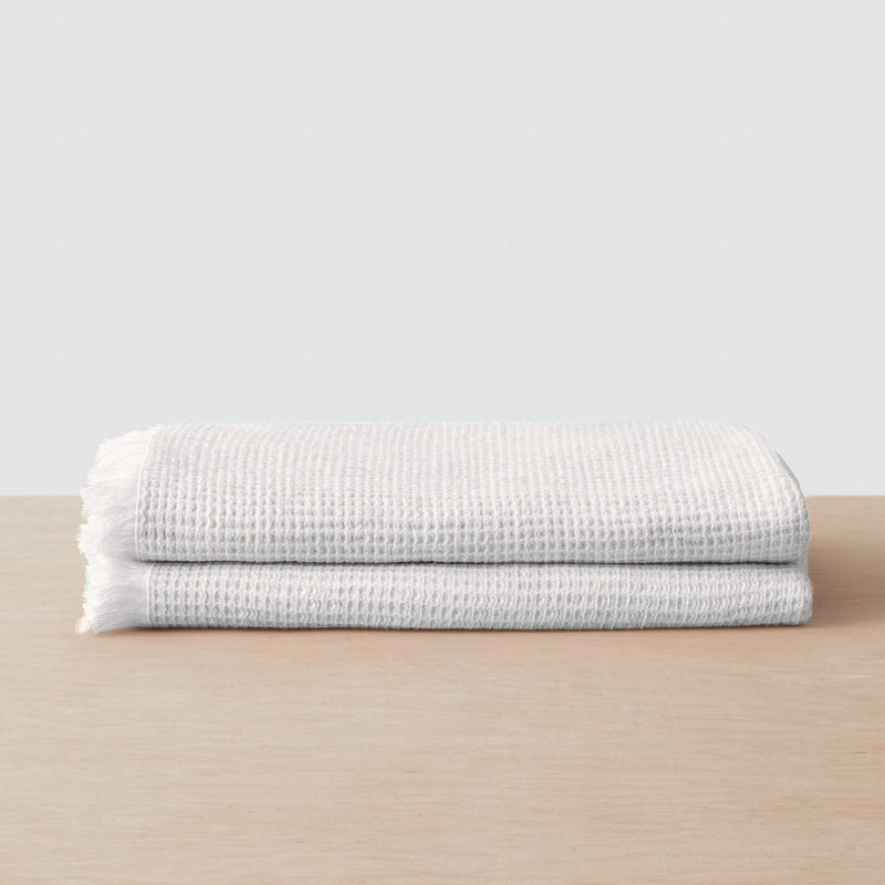 Set of two white waffle weave bath towels, white