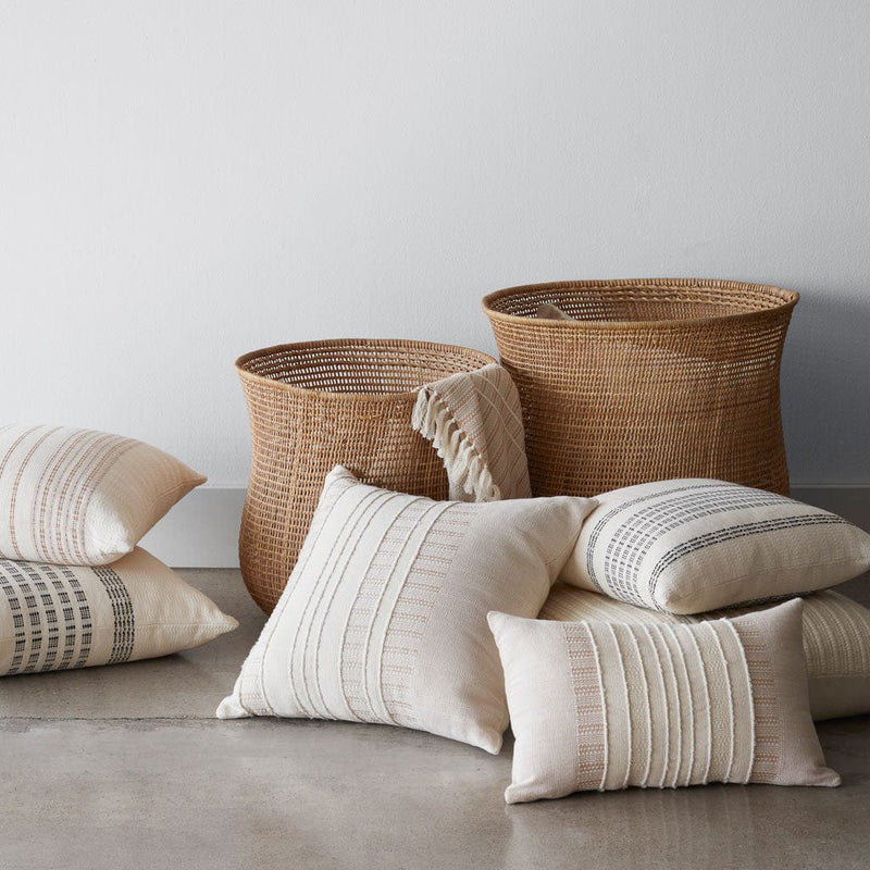 Cotton Throw Pillows and Woven Baskets from The Colombia Collection, tan