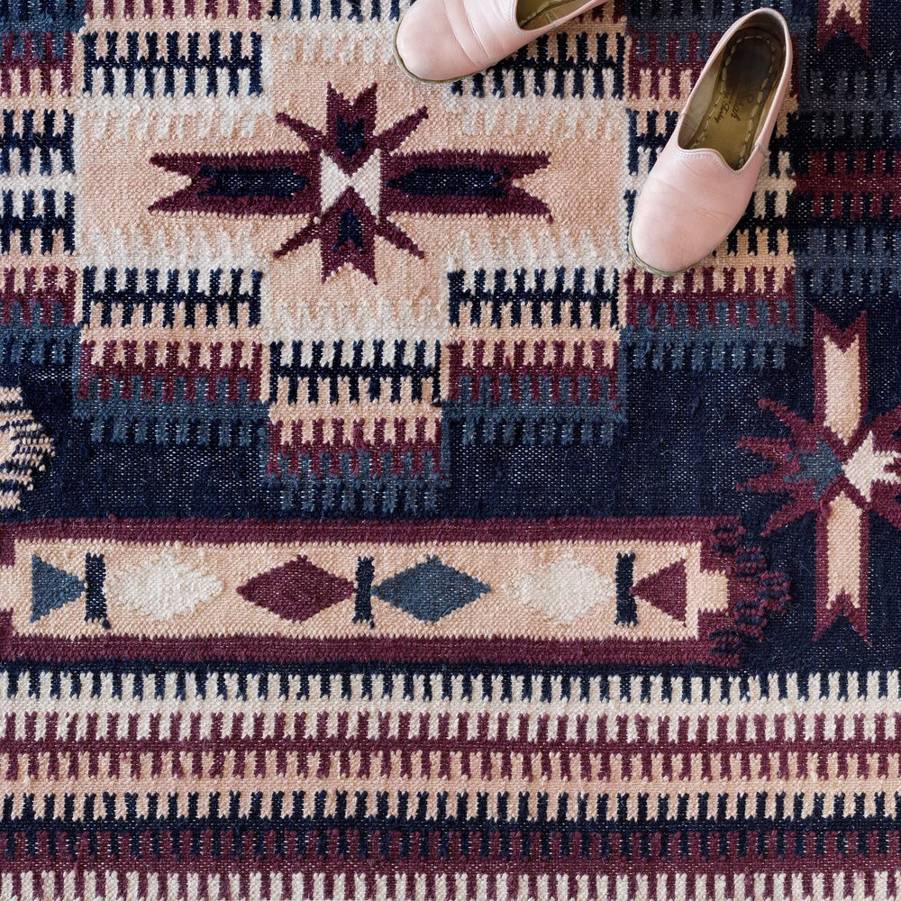 Overhead View of Blush and Navy Area Rug