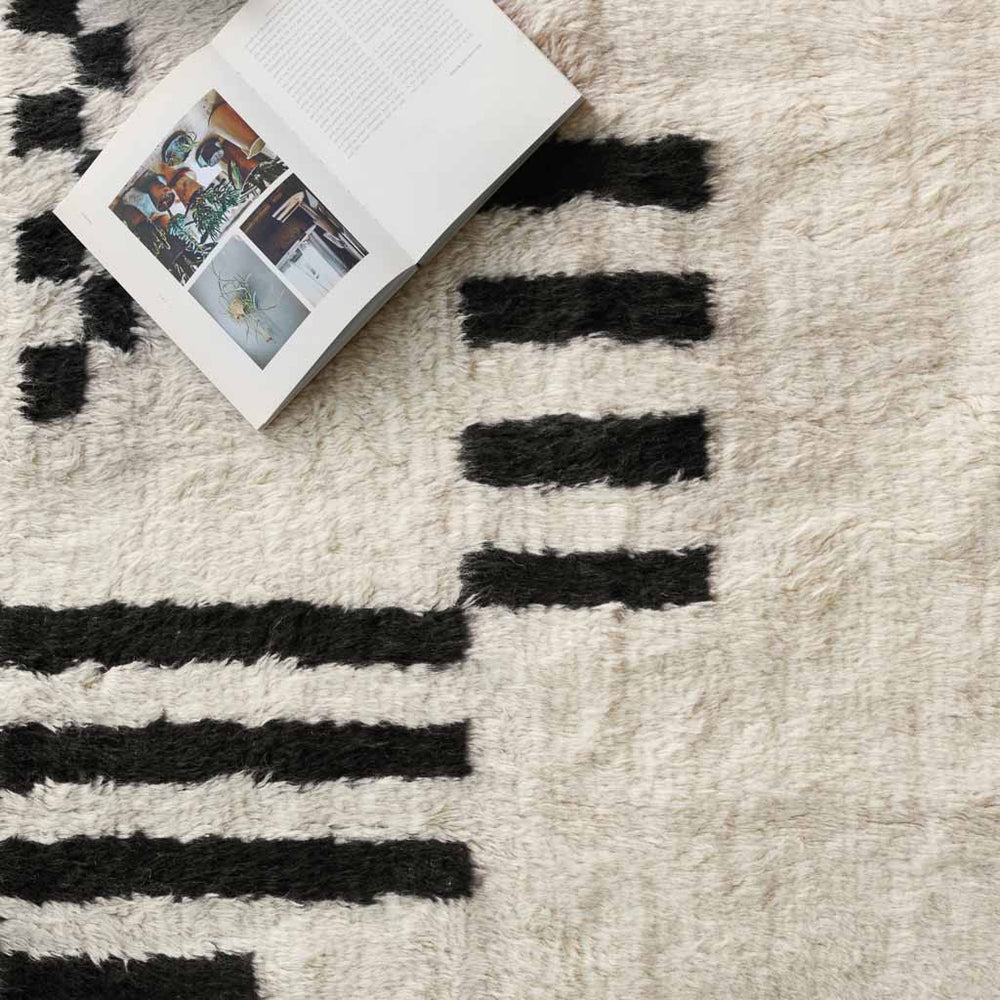 High-Pile Fluffy Rug in Black and Cream