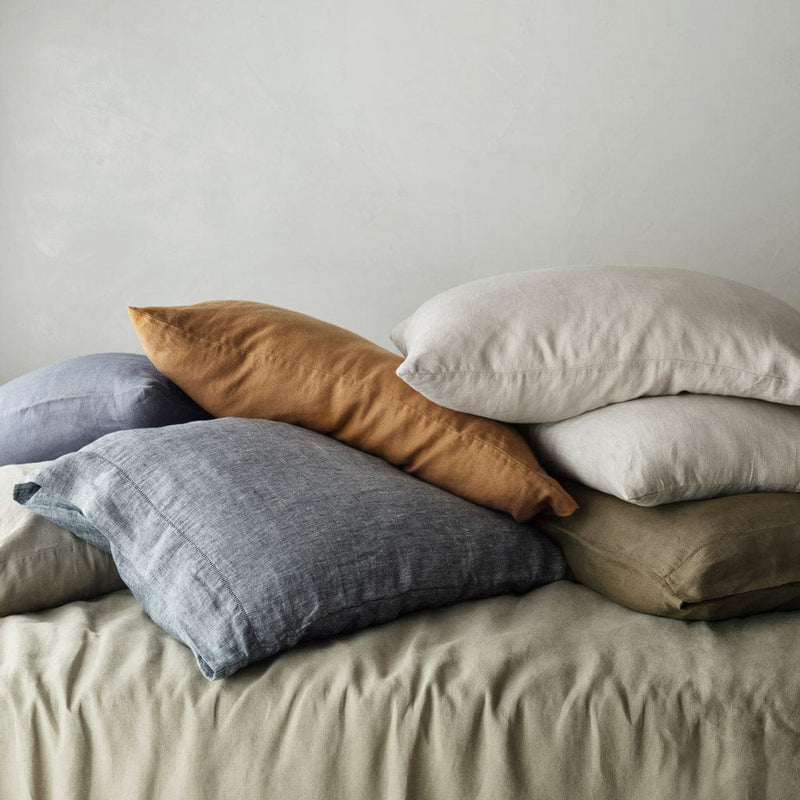 Overhead of Multi-colored Linen Pillows, solid-sand