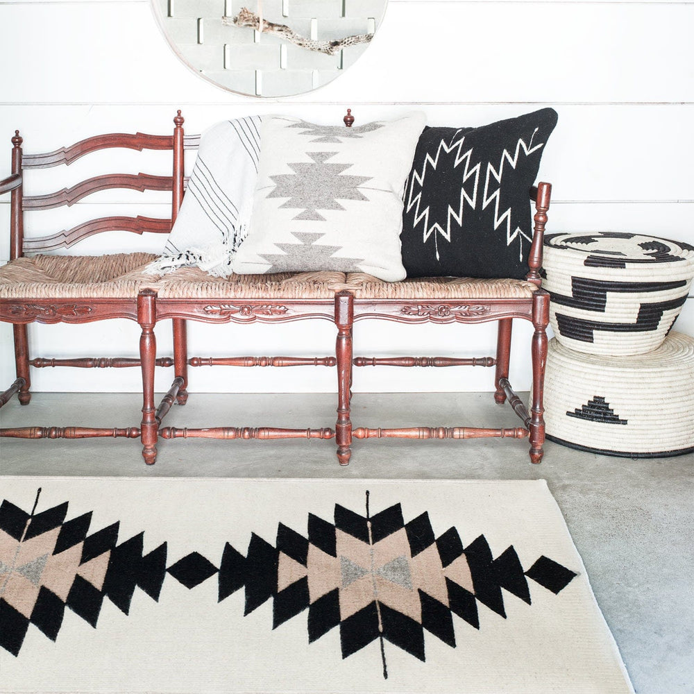 Woven Rug in Black and Blush with Wool Pillows