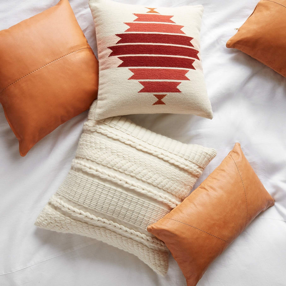 Pillows Tossed on Bed