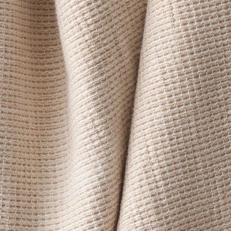 Detail of warm tan cotton spa towel, tan