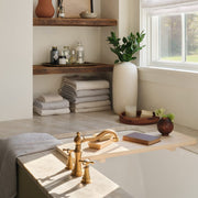 Modern bathroom with tan waffle weave towels, tan