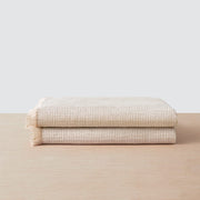 Set of two tan bath towels, tan