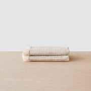 Set of two warm tan waffle weave washcloths, tan