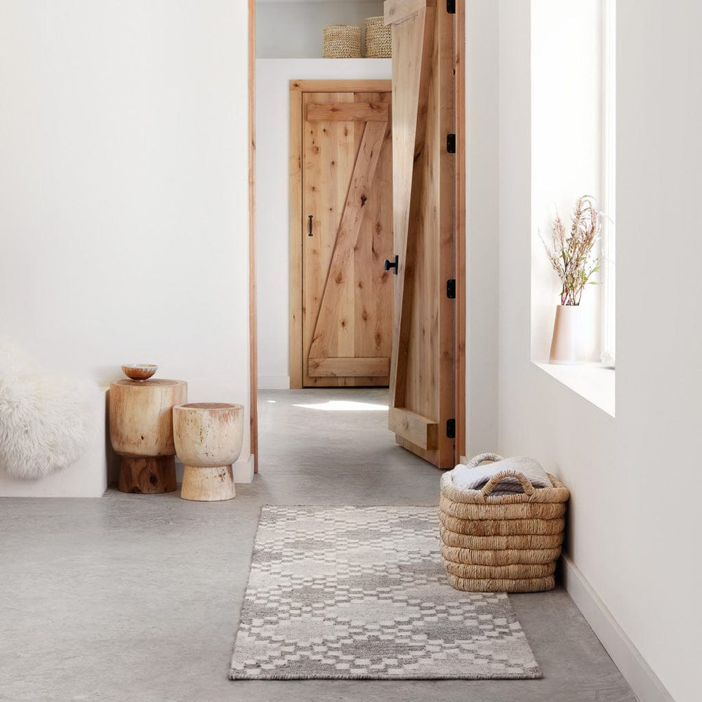 Grey Wool Runner with Woven Baskets and Stump Stools in Modern Farmhouse