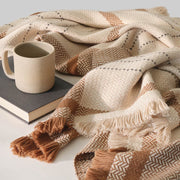 baby alpaca throw with mug and book, tan