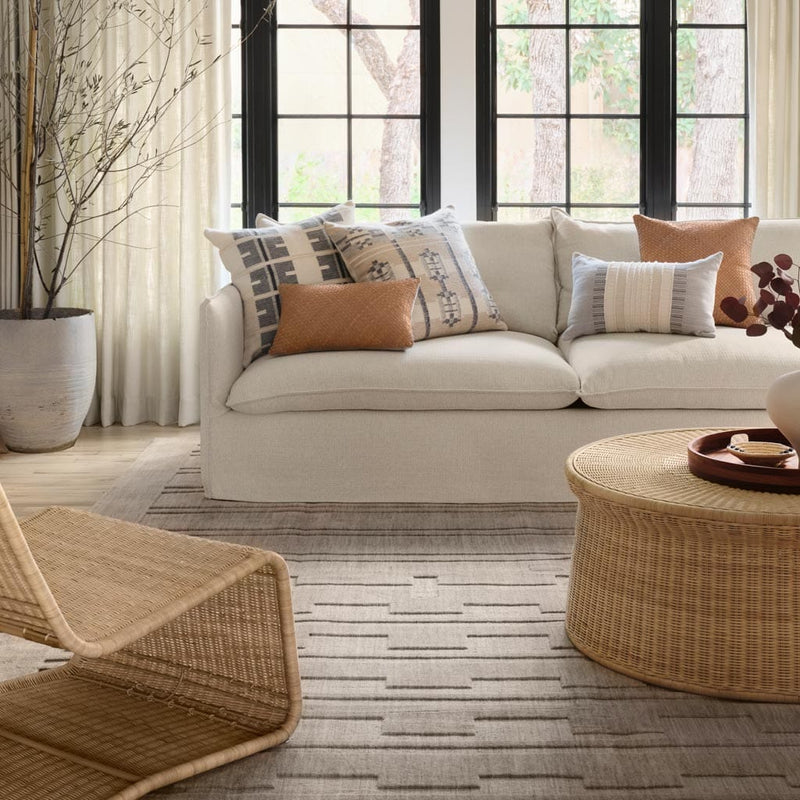 amrya area rug styled in living room, light grey