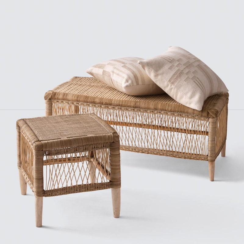 Woven Bench styled with pillows and ottoman, rattan, natural