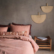 Handwoven oversized lumbar styled on bed, Sienna