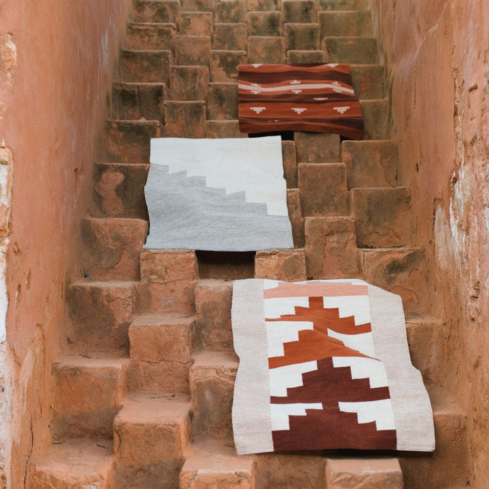 Handwoven Wool Accent Rugs on Stairstep Architecture in Oaxaca