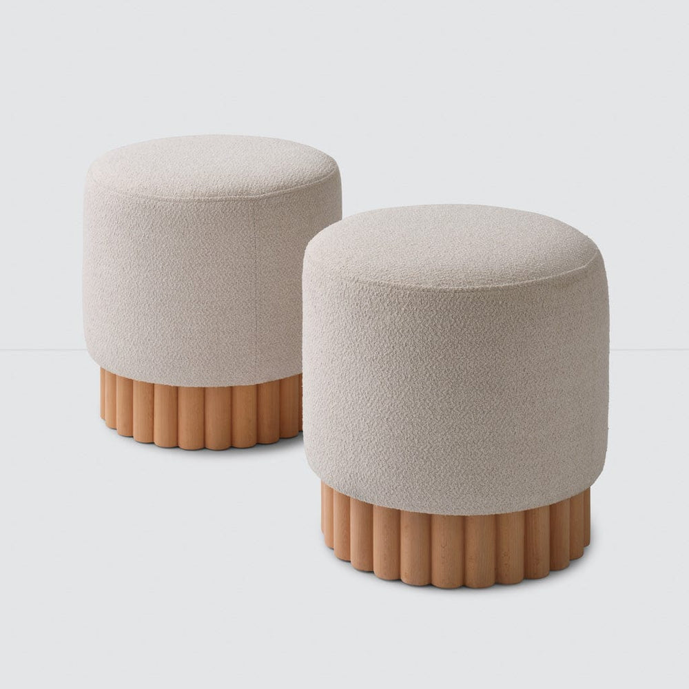 Set of two Centro boucle ottomans with wood base