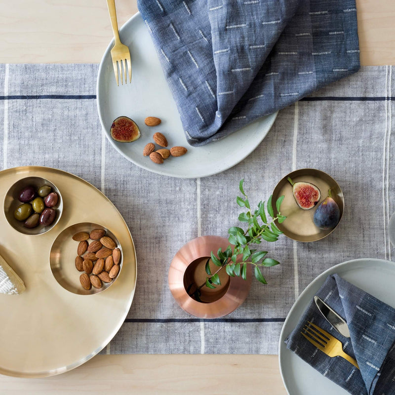 napkins styled on table with runner, blue