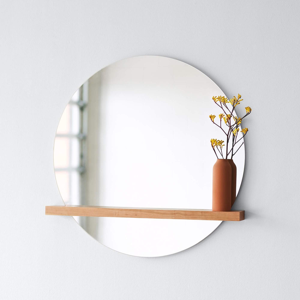 Large Circular Wall Mirror with Wood Shelf and Terracotta Vase