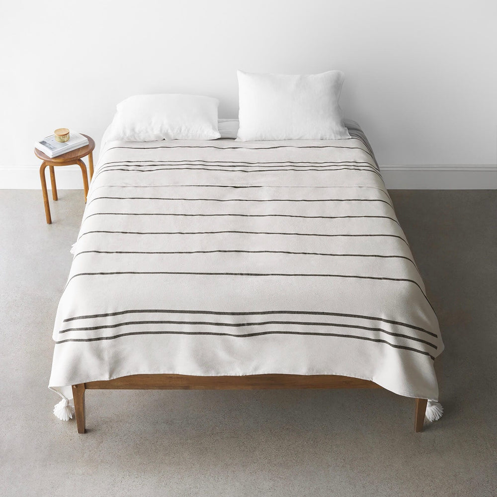 Striped cotton bed blanket with cream tassels
