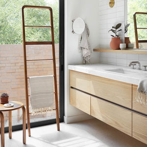 teak wooden side table in bathroom