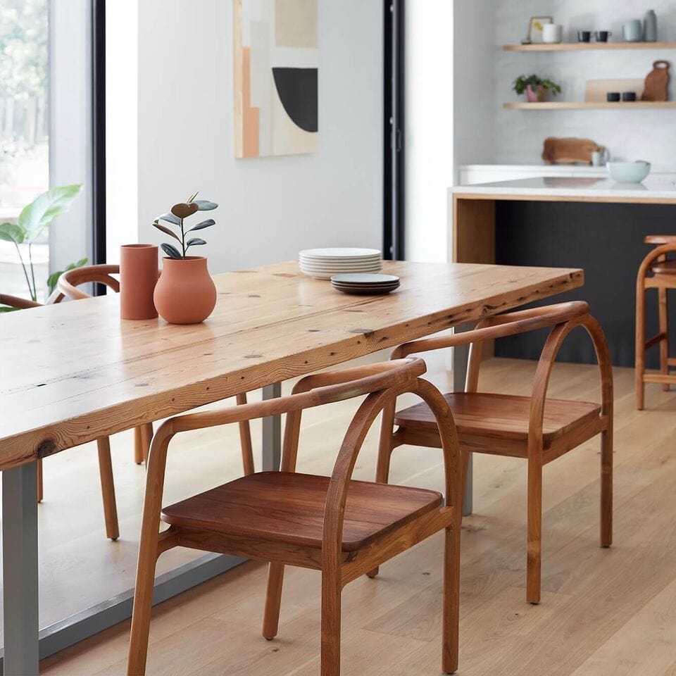 teak wooden chairs at dining table