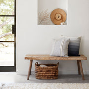 Styled Image of Indigo and Grey Alpaca Pillows and Woven Basket, grey