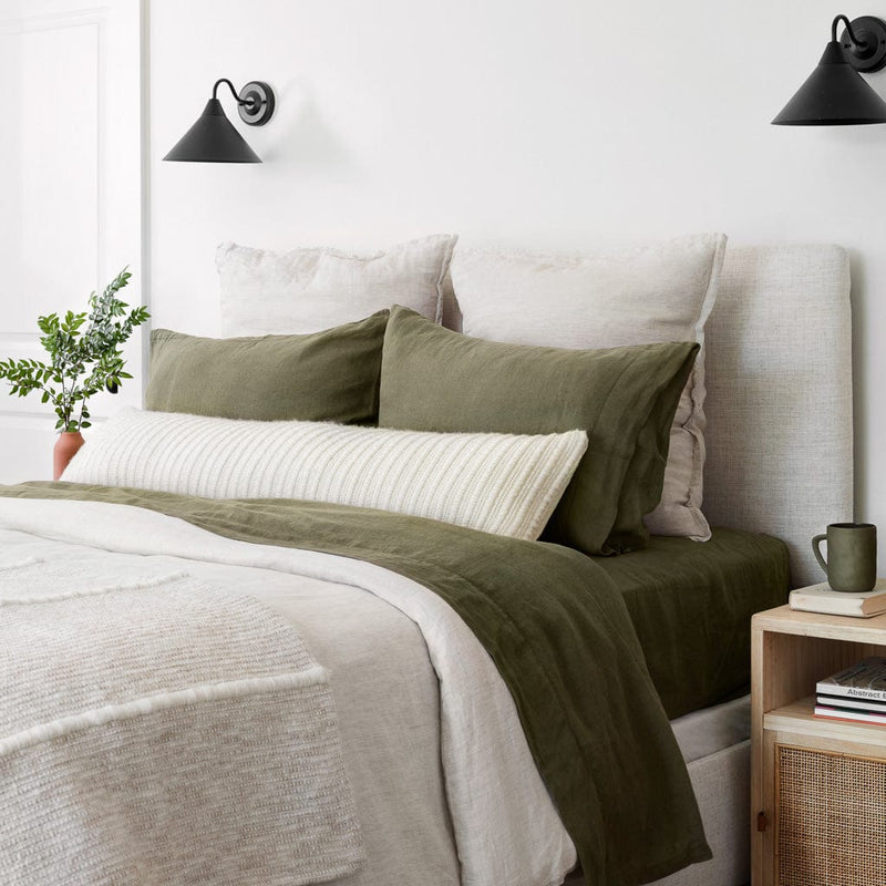 Styled Image with Tan Textured Throw Blanket and Olive Green Linen Bedding, sand