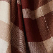 close up of alpaca throw tan and rust, rust