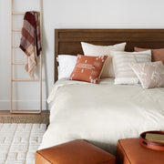 Alpaca throw styled on ladder in bedroom tan and rust, rust