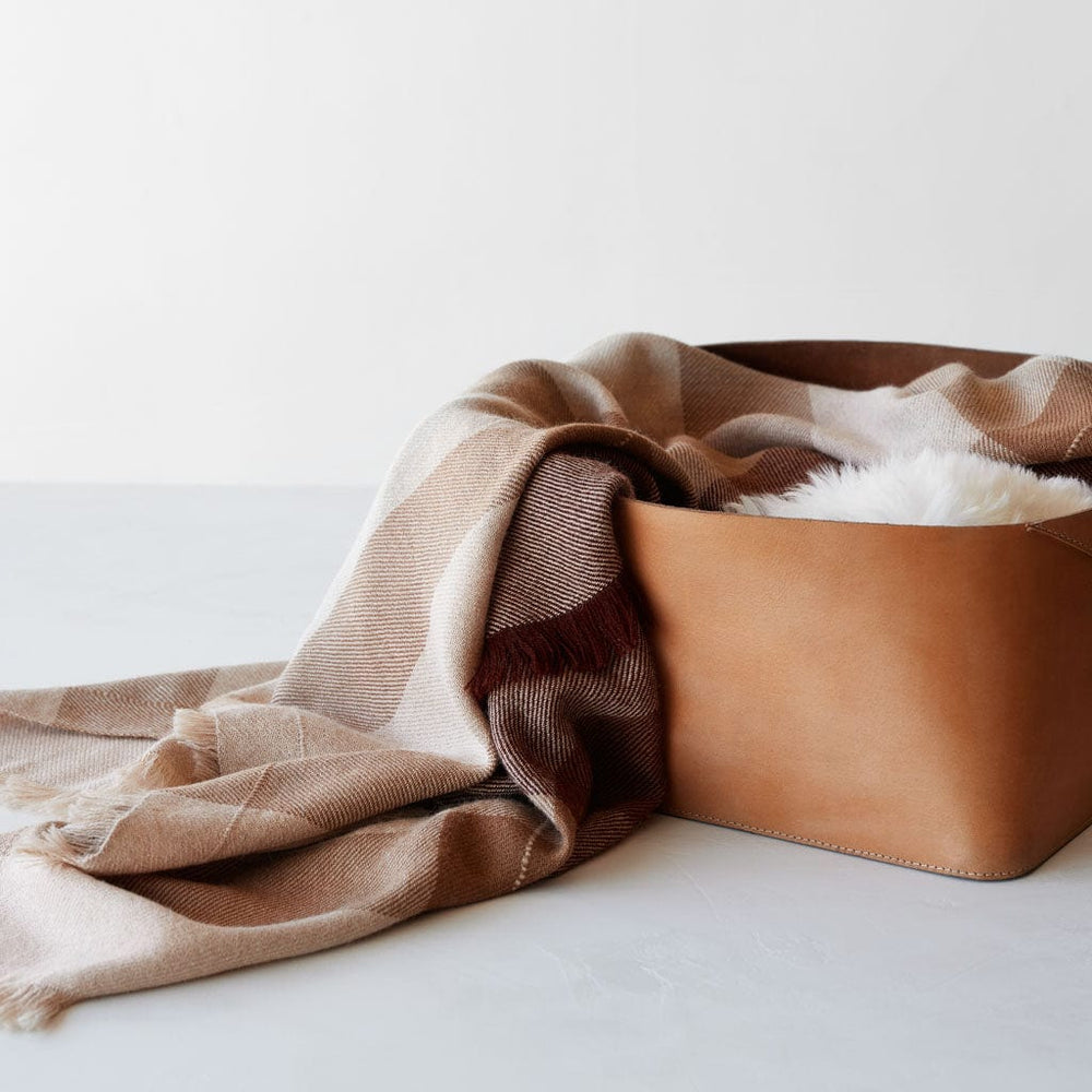 Alpaca throw styled with leather bin, tan and rust