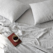 Overhead of Linen Pillows and Sheet Set in Stripe Pattern, graphite-thin-stripe