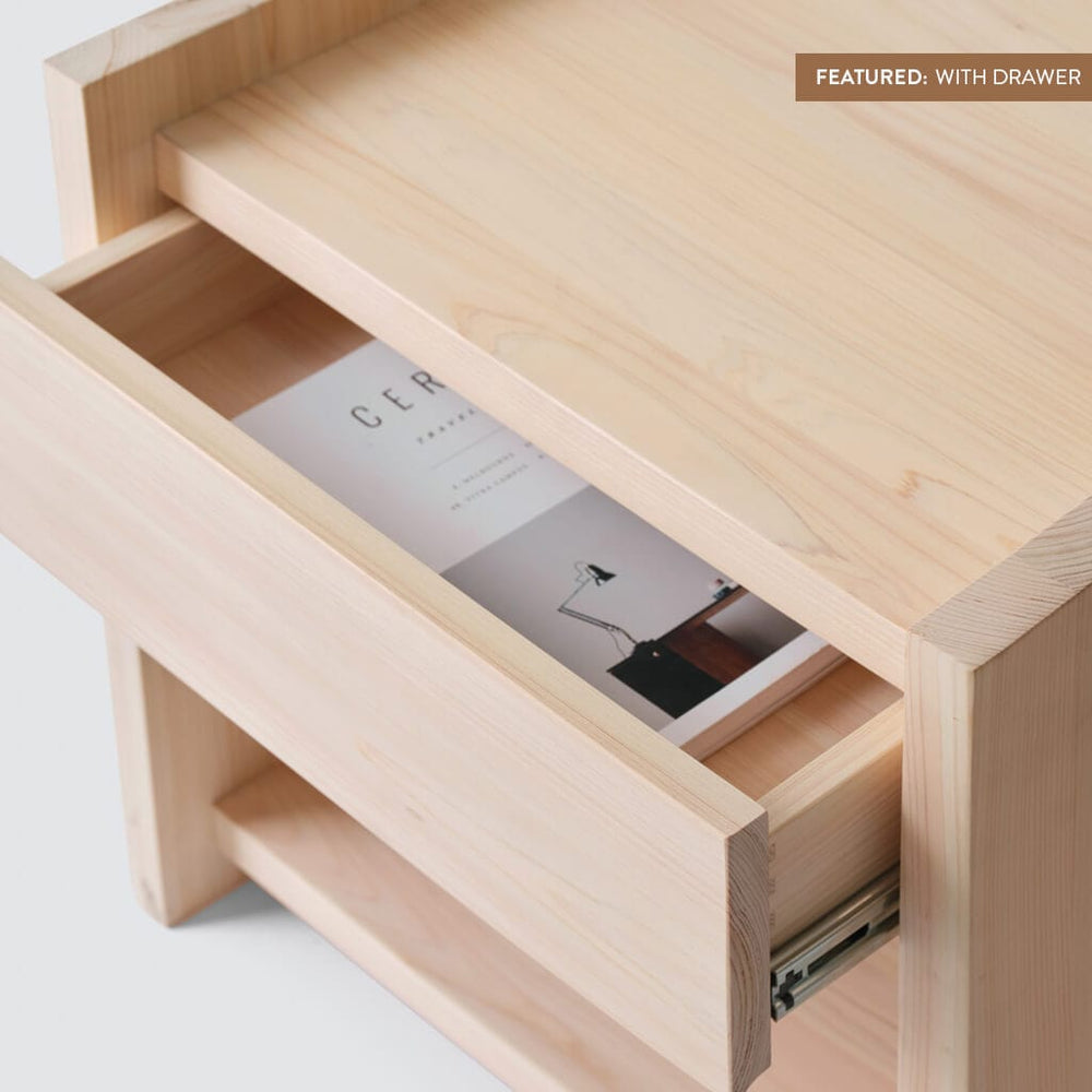 Overhead view of partially open drawer in hinoki wood nightstand 
