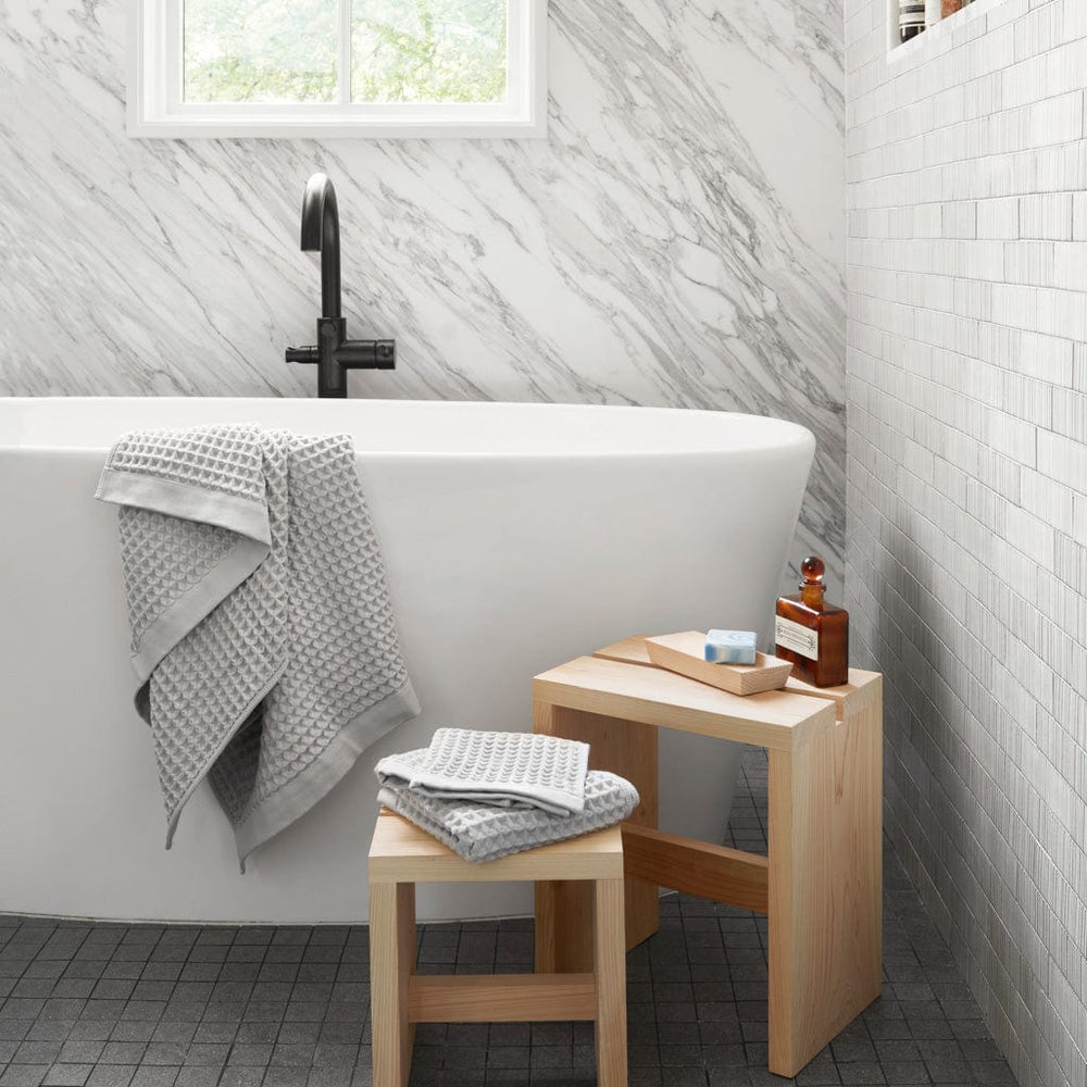Modern Hinoki Wood Bath Stools in Marble Bathroom