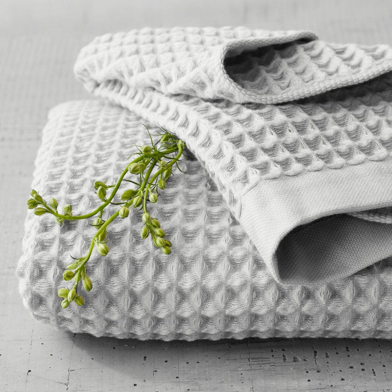 Folded waffle towels with greenery, light-grey
