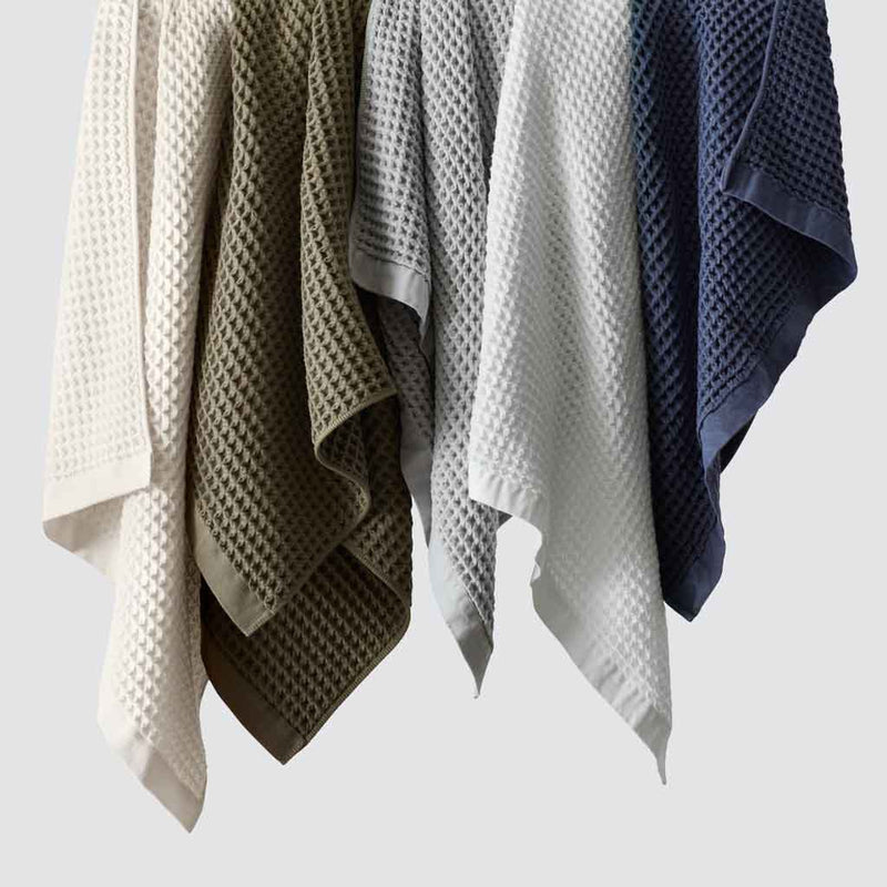 Hanging waffle towels in navy and grey and cream, olive