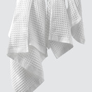 White waffle towels hanging, white