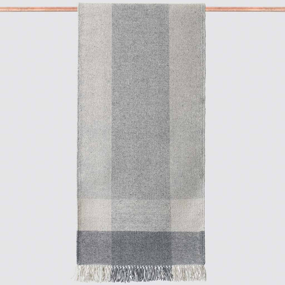 Large plaid pattern rug in gray hues