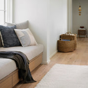 Wool textured pillow styled in living room, navy