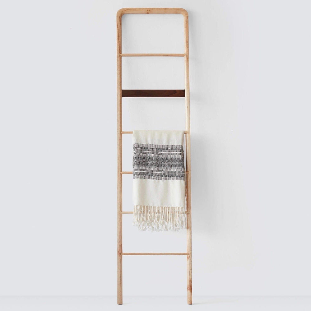 light wood ladder with towel