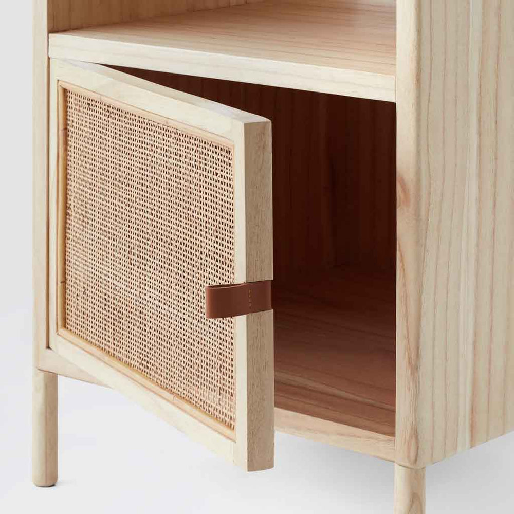 Detail of cane and wood nightstand door, light-mindi