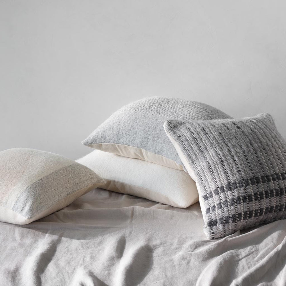 Pile of woven pillows