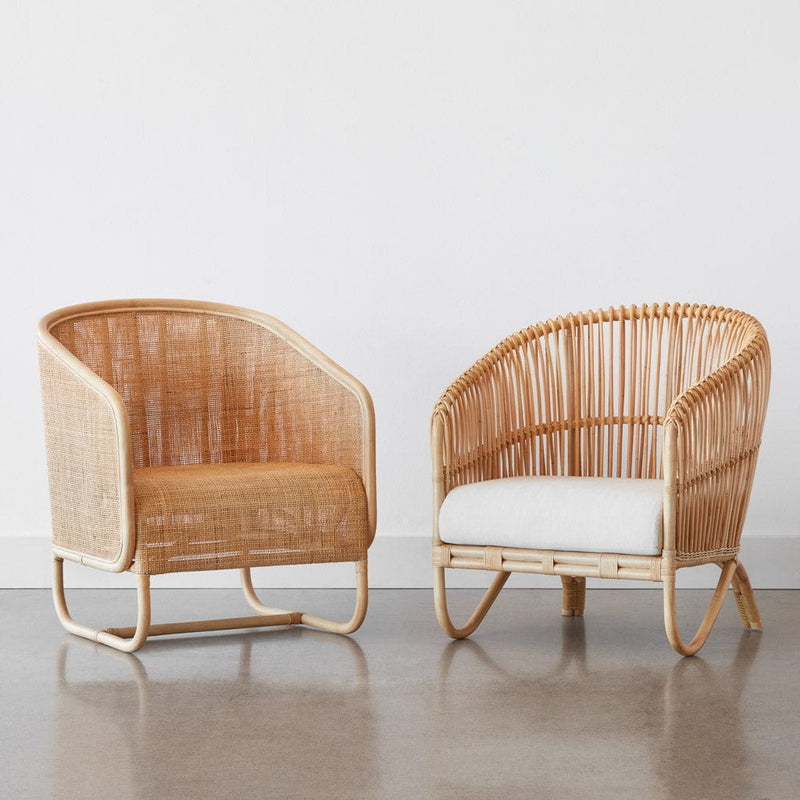 Cane and rattan chairs side-by-side, natural