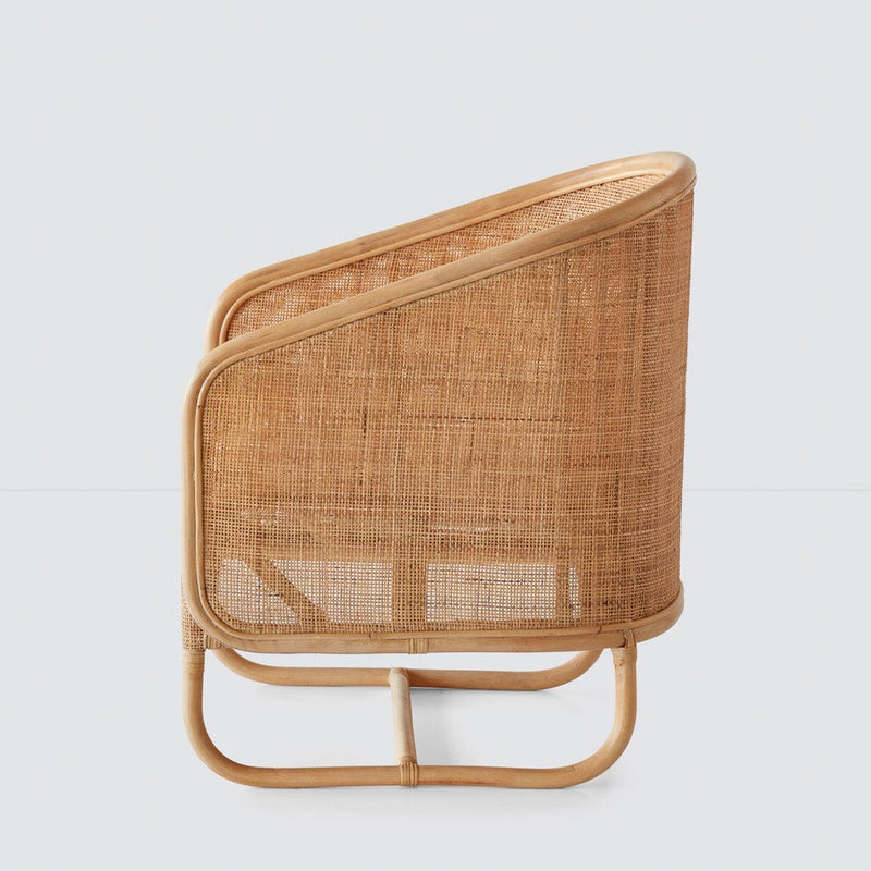 Cane chair from the side, natural