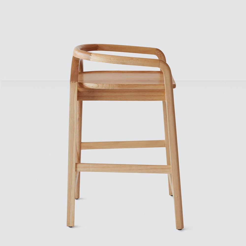 mindi light wood counter stool side view