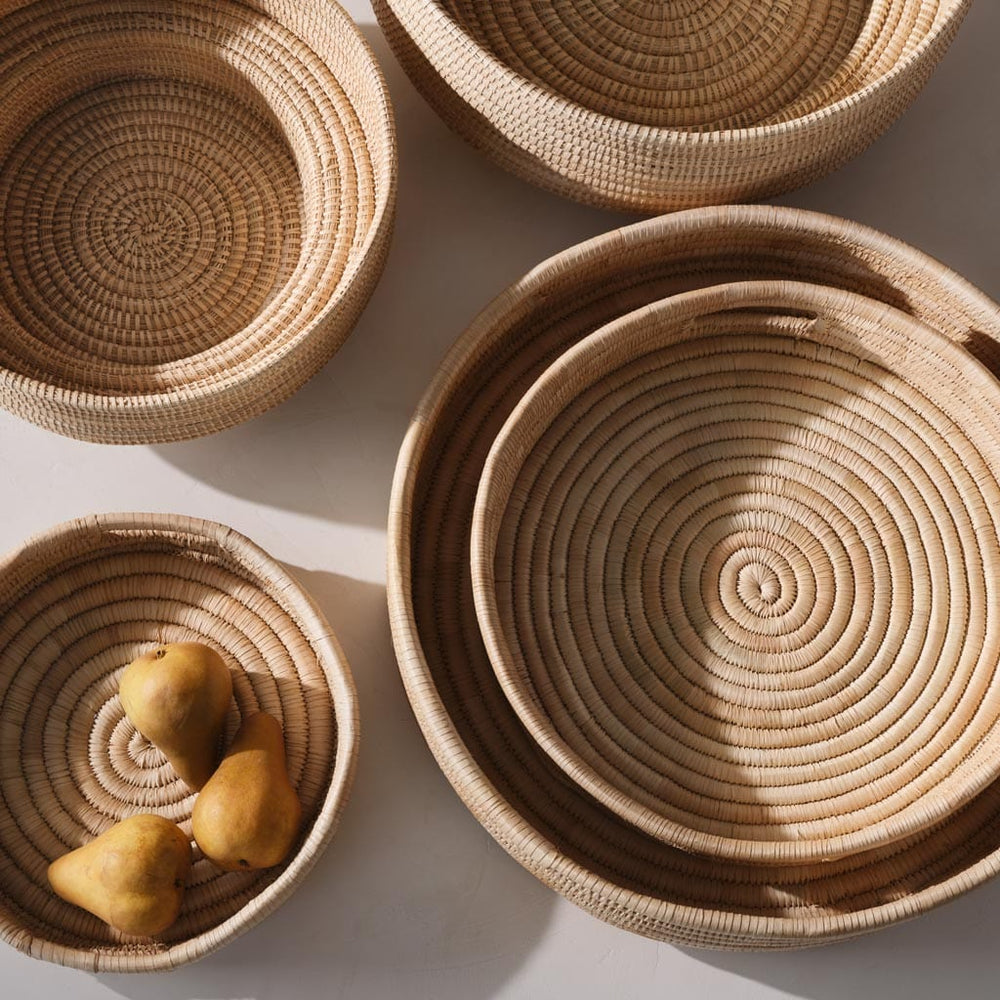 Overhead group shot of woven trays and bowls