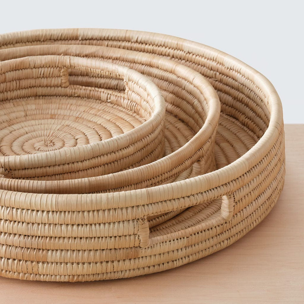 Woven trays sitting in size order