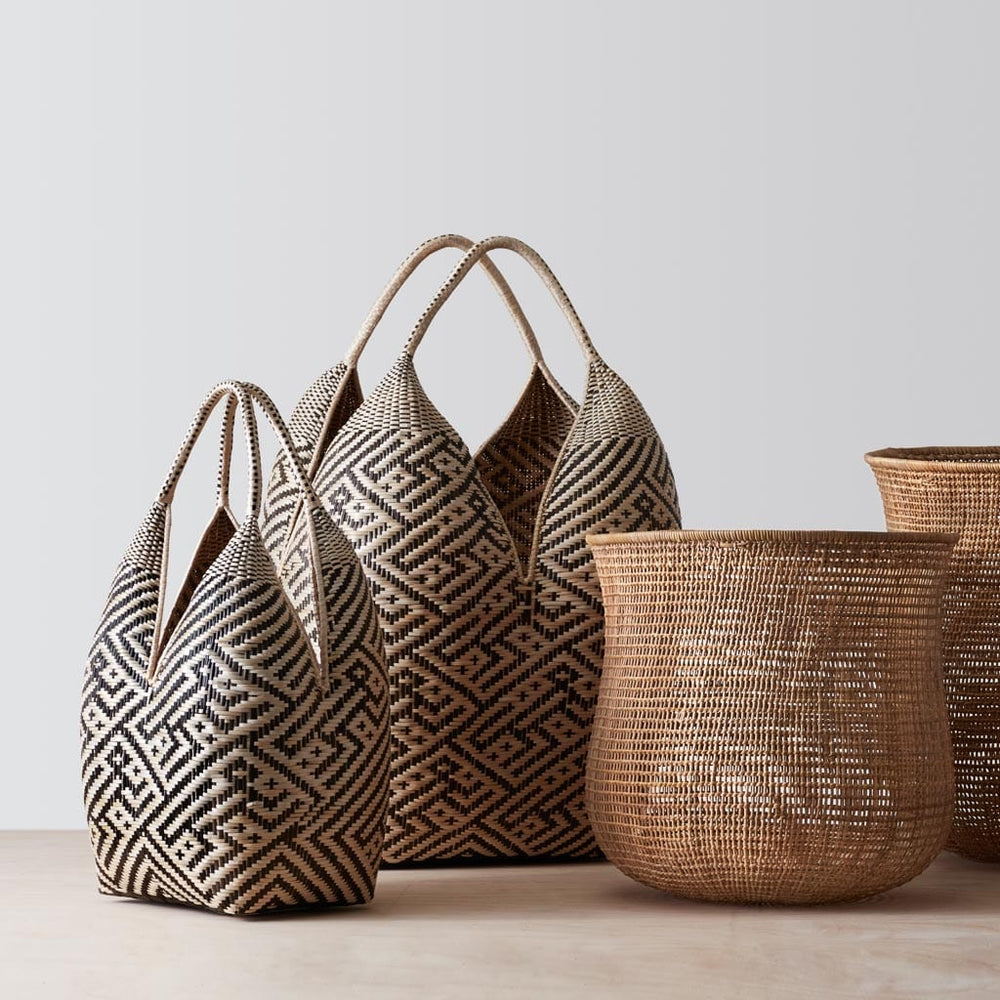 Group of Handwoven Baskets in Natural and Black Fibers