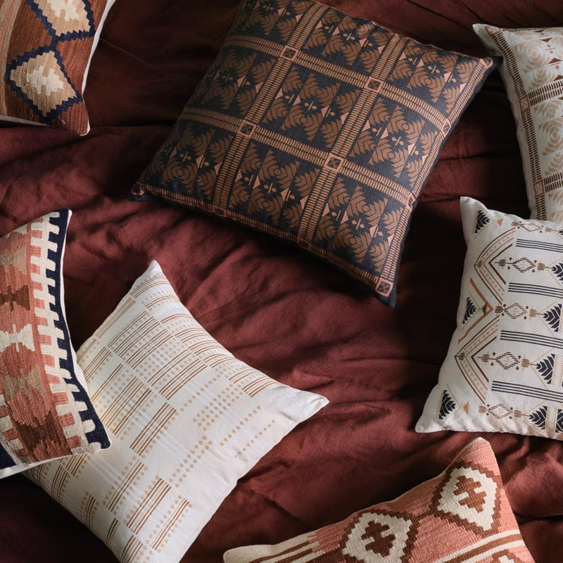 overhead of block printed pillows, Navy