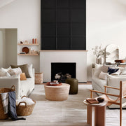 Flatweave flax wool area rug in modern living room with neutral seating and fireplace, flax