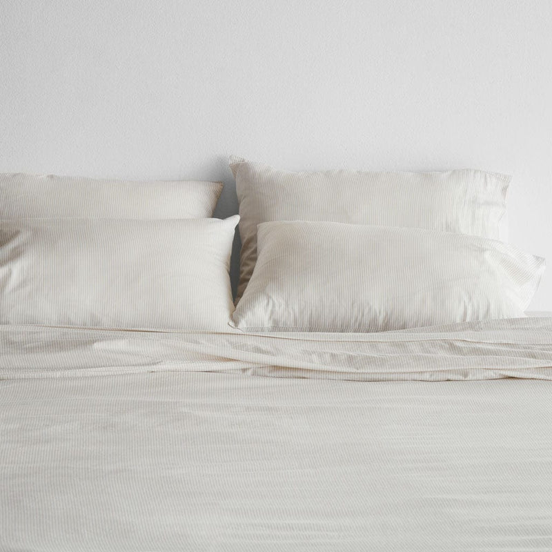 Organic turkish pillows on duvet, sand-stripe