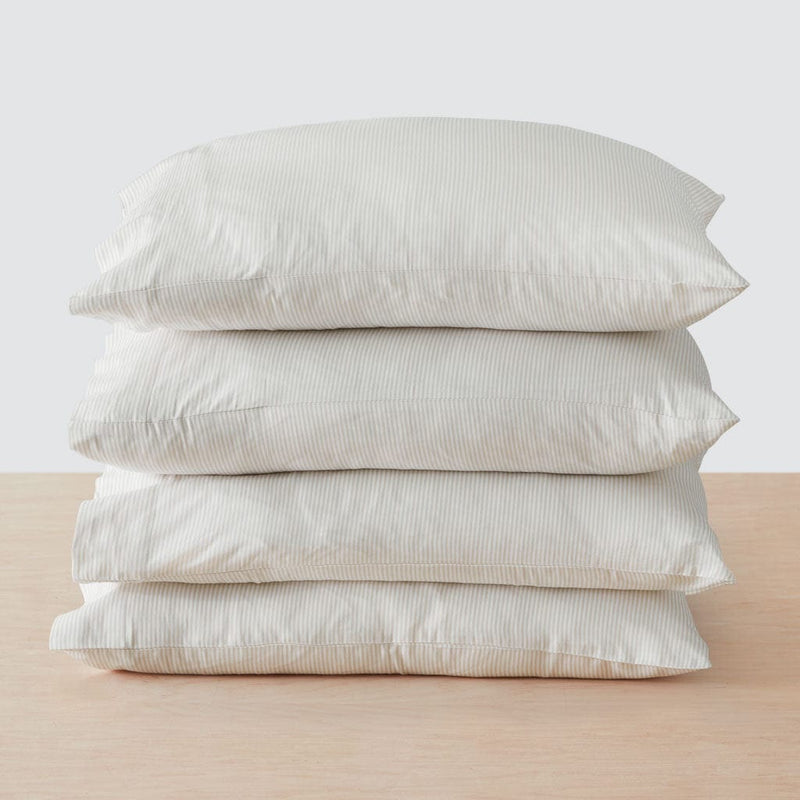 Stack of four pillows, sand-stripe