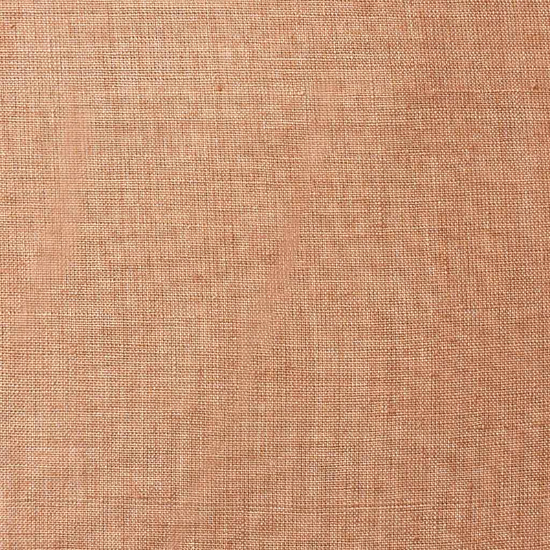 Detail of pink woven linen pillow, clay